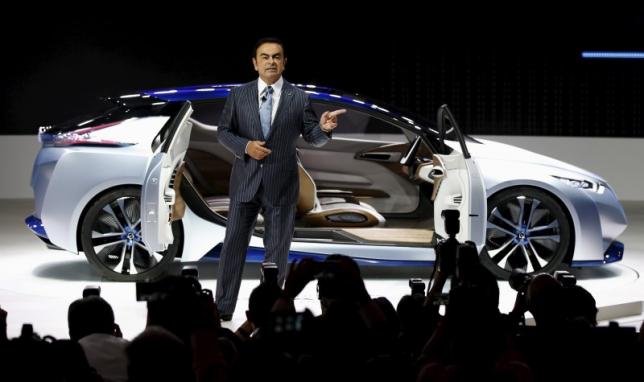 Carlos Ghosn, CEO of the Renault-Nissan Alliance speaks in front of the Nissan IDS concept car during a presentation at the 44th Tokyo Motor Show in Tokyo, Japan, October 28, 2015. REUTERS/Toru Hanai